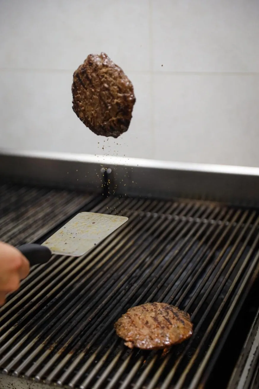The ritual: meat on live grill